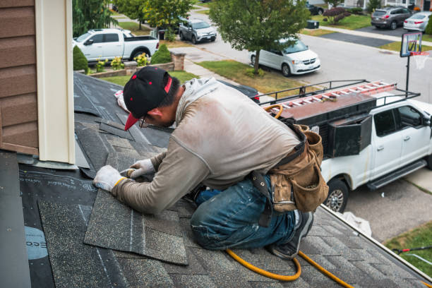 Professional Flat Roof Repair technician working in Sandyville, OH